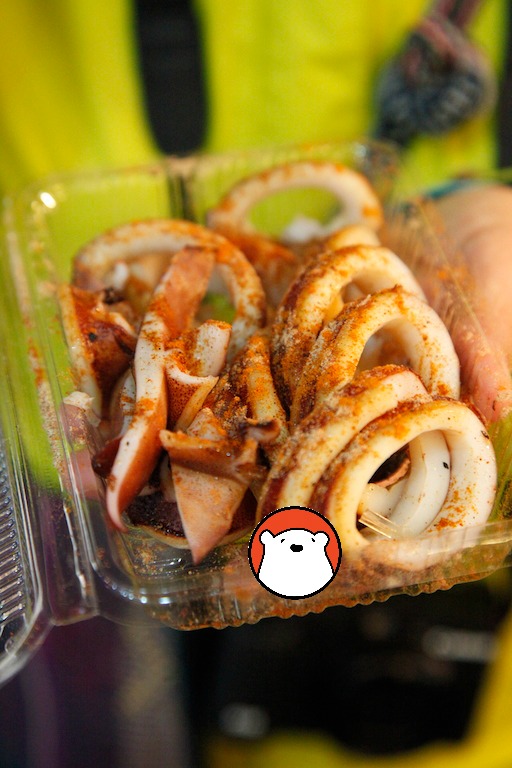 The par-boiled and grilled squid with flavouring powder. You can choose, spicy or not spicy. 