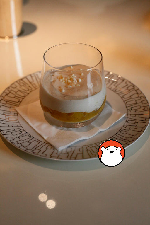 A dessert of tropical mousse, pineapple compote, caramel and chantilly cream.