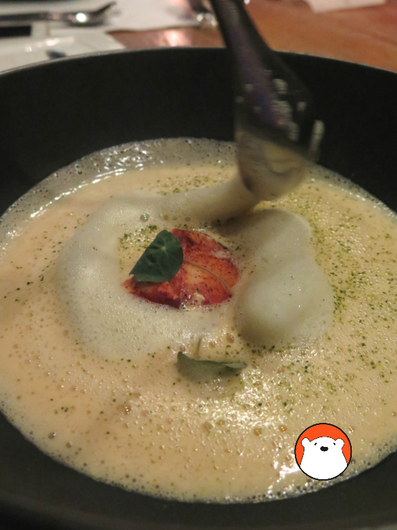 Lobster Bisque Scented with Cognac (Bt410++) with macha cappuccino, lobster and yuzu.