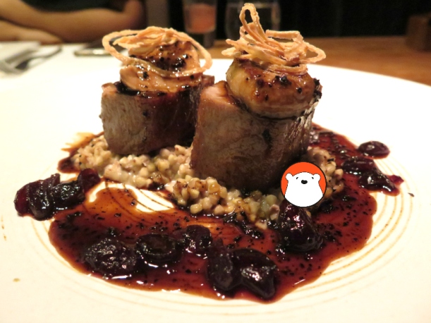 A main course from the Rossini menu: Tuna Medallion and Foie Gras (Bt1,200++) with dried cranberries, buck wheat, truffle sauce.